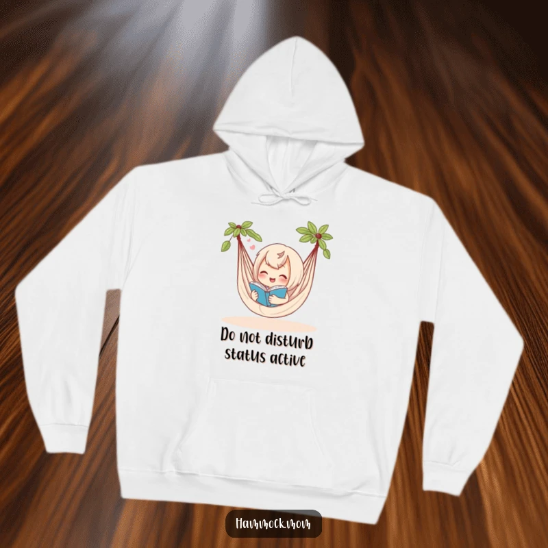 Funny hoodie depicting a delighted hammock character lost in a book, expressing a contented sigh, perfect for cozy humor.