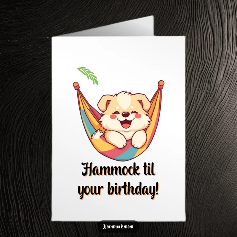 Funny Free Printable Birthday Card: Fluffy mama dog smiling wide, swaying lazily in a colorful hammock.