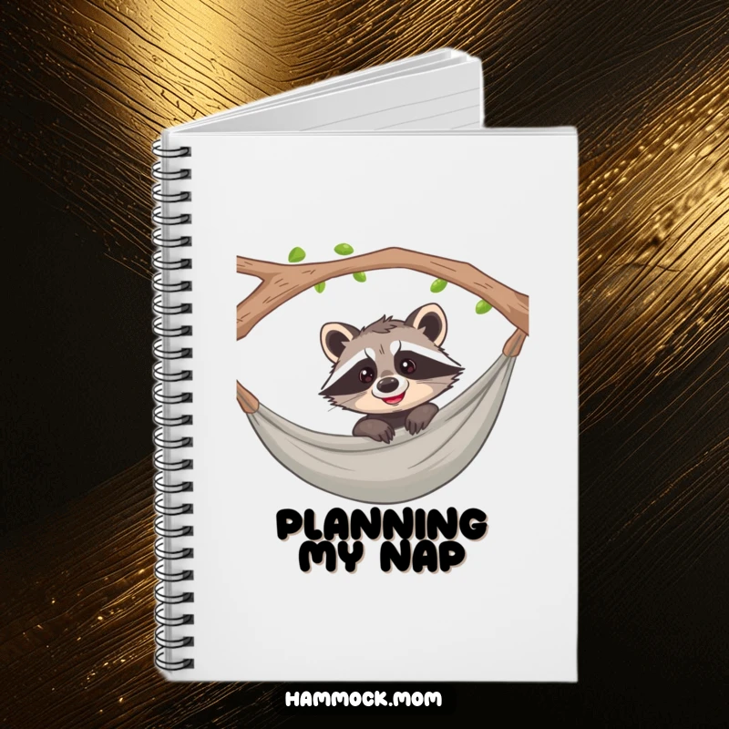 Funny raccoon peeking with a curious grin from a hammock on the cover of a notebook, inspiring creativity.