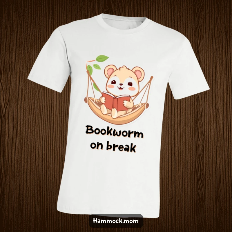 Funny t-shirt of a happy animal character engrossed in a book while gently swaying in a hammock, capturing the essence of cozy reading.