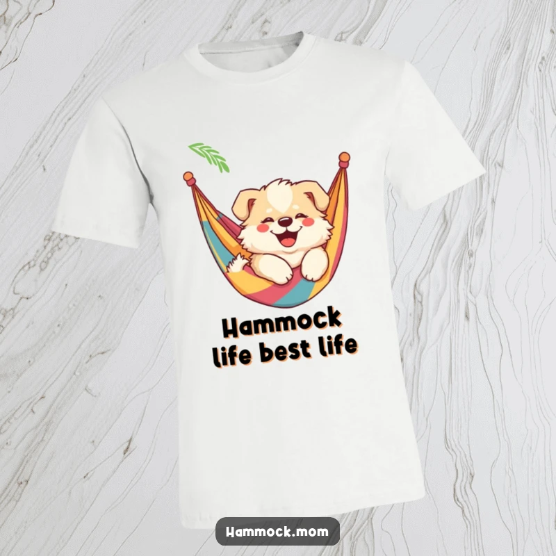 Funny mama dog t-shirt featuring a fluffy mama dog with a big smile, lounging lazily in a vibrant, colorful hammock.
