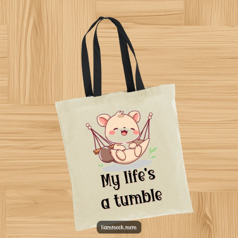 Funny tote bag depicting a playful animal character giggling with delight as their hammock tips, perfect for carrying fun and laughter.